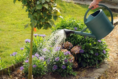 Keyboard and hands navigating an online booking form for local gardening events